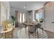 Modern dining room with a round table and neutral decor at 2819 1St S Ave, St Petersburg, FL 33712