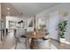 Bright dining room with a round wooden table and gray chairs at 2819 1St S Ave, St Petersburg, FL 33712