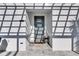 Modern front door with gray finish and glass panels, welcoming entryway at 2819 1St S Ave, St Petersburg, FL 33712