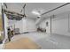 Spacious garage with overhead storage and epoxy floor at 2819 1St S Ave, St Petersburg, FL 33712