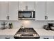 Modern kitchen with gas stove and stainless steel microwave at 2819 1St S Ave, St Petersburg, FL 33712