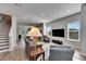 Bright living room with hardwood floors, modern TV, and comfortable seating at 2819 1St S Ave, St Petersburg, FL 33712