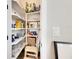 Well-stocked pantry with ample shelving for storage at 2819 1St S Ave, St Petersburg, FL 33712