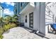 Private paved patio with gray door and pergola at 2819 1St S Ave, St Petersburg, FL 33712
