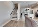 Modern staircase with dark wood accents and gray walls at 2819 1St S Ave, St Petersburg, FL 33712