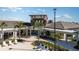 Community center with outdoor seating and landscaping at 31672 Cardinal Yard Dr, San Antonio, FL 33576