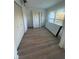 Spacious bedroom with hardwood floors and closet at 3305 W Oak Ave, Plant City, FL 33563