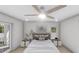 Spacious bedroom with ceiling fan and large window at 3305 W Oak Ave, Plant City, FL 33563