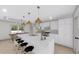 Modern kitchen with white cabinets and island at 3305 W Oak Ave, Plant City, FL 33563