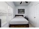 Bedroom with double bed, ceiling fan and large window at 331 25Th S St, St Petersburg, FL 33712