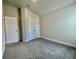 Bright bedroom with carpet and double door closet at 36197 Trinity Glade Rd, Dade City, FL 33525