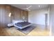 Bright bedroom featuring wood-look floors and modern decor at 4009 W Euclid Ave, Tampa, FL 33629