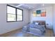 Spacious bedroom with large window and a comfortable bed at 4009 W Euclid Ave, Tampa, FL 33629