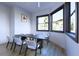 Bright dining room with large windows and seating for six at 4009 W Euclid Ave, Tampa, FL 33629