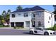 Two-story home with stone accents and two-car garage at 4009 W Euclid Ave, Tampa, FL 33629