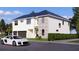 Contemporary two-story home with stone accents and attached garage at 4009 W Euclid Ave, Tampa, FL 33629