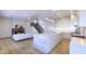 Open concept kitchen and living area with a marble island at 4009 W Euclid Ave, Tampa, FL 33629