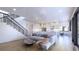 Open living room with modern staircase and kitchen view at 4009 W Euclid Ave, Tampa, FL 33629