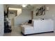 Living room with sectional sofa and view of entryway stairs at 4410 Summer Savory St, Tampa, FL 33619