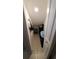 Small storage room with shelving and tile floor at 4410 Summer Savory St, Tampa, FL 33619