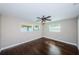 Bright bedroom with hardwood floors and ceiling fan at 5265 Denver Ne St, St Petersburg, FL 33703