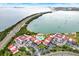 Aerial view of waterfront community with pool and parking at 6365 Bahia Del Mar Blvd # 604, St Petersburg, FL 33715