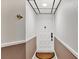 Simple condo entryway with a white door and neutral-colored walls at 6365 Bahia Del Mar Blvd # 604, St Petersburg, FL 33715