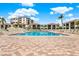 Inviting pool area with lounge chairs and surrounding buildings at 6365 Bahia Del Mar Blvd # 604, St Petersburg, FL 33715