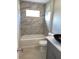 Updated bathroom with marble shower and vanity at 6905 Sotra St, Wesley Chapel, FL 33545