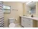 Clean bathroom, featuring a shower and vanity at 7803 Cadillac Ave, Hudson, FL 34667