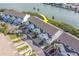 Aerial view of property and its waterfront access at 905 Hidden Harbour Dr, Indian Rocks Beach, FL 33785