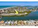 Wide aerial showcasing the waterfront location of the property and coastal views at 905 Hidden Harbour Dr, Indian Rocks Beach, FL 33785