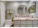 Bathroom with granite countertop, white cabinets, and a walk-in shower at 905 Hidden Harbour Dr, Indian Rocks Beach, FL 33785