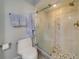 Small bathroom with a toilet and a shower at 905 Hidden Harbour Dr, Indian Rocks Beach, FL 33785