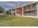 Back exterior view showing multiple units with decks at 905 Hidden Harbour Dr, Indian Rocks Beach, FL 33785