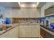Bright kitchen with granite countertops and stainless steel appliances at 905 Hidden Harbour Dr, Indian Rocks Beach, FL 33785