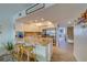 Kitchen features granite countertops, stainless steel appliances, and breakfast bar at 905 Hidden Harbour Dr, Indian Rocks Beach, FL 33785