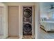 Stackable washer and dryer in a closet at 905 Hidden Harbour Dr, Indian Rocks Beach, FL 33785
