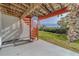 Exterior spiral staircase leading to a waterfront view at 905 Hidden Harbour Dr, Indian Rocks Beach, FL 33785