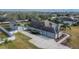 Aerial view of the house, detached garage, and backyard at 9413 Swift Creek Cir, Dover, FL 33527