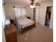 Bright bedroom with double bed, ample closet space, and window at 9608 41St N St # 2, Pinellas Park, FL 33782