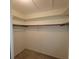 Large walk-in closet with ample shelving and hanging space at 9608 41St N St # 2, Pinellas Park, FL 33782