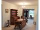 Dining area with a wooden table, chairs, and hutch at 9608 41St N St # 2, Pinellas Park, FL 33782