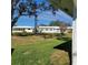 View of the community with well-maintained lawns at 9608 41St N St # 2, Pinellas Park, FL 33782