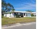Charming single story home with a lush lawn at 9608 41St N St # 2, Pinellas Park, FL 33782