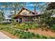 Craftsman home with mature landscaping and a welcoming front porch at 106 15Th Ne Ave, St Petersburg, FL 33704