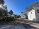 White home with alley access and detached building at 1105 W De Leon St, Tampa, FL 33606