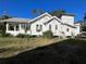 White two-story home with large backyard at 1105 W De Leon St, Tampa, FL 33606