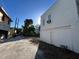 White building with alley access and detached structure at 1105 W De Leon St, Tampa, FL 33606