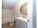 Clean bathroom with vanity, toilet and bathtub at 12816 Midvale Ave, New Port Richey, FL 34654
